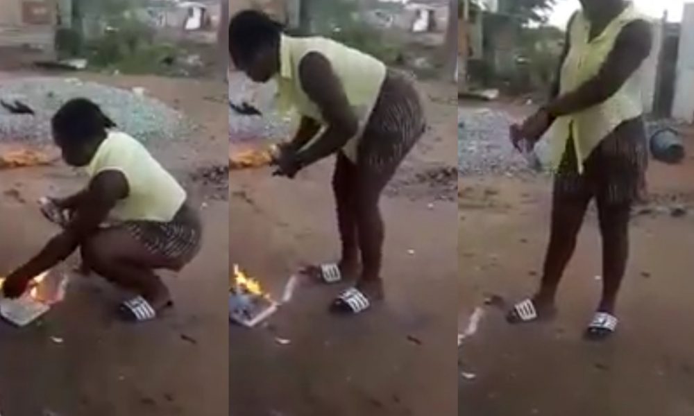 Slay Queen says as she burns Holy Bible
