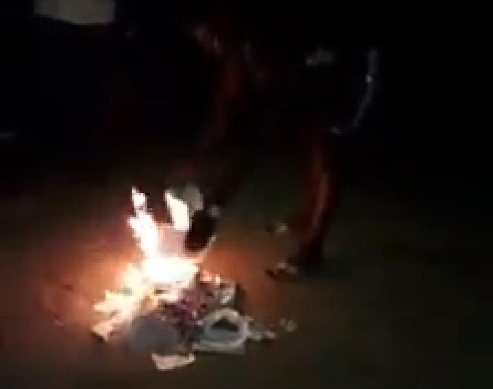 Man sets bible on fire
