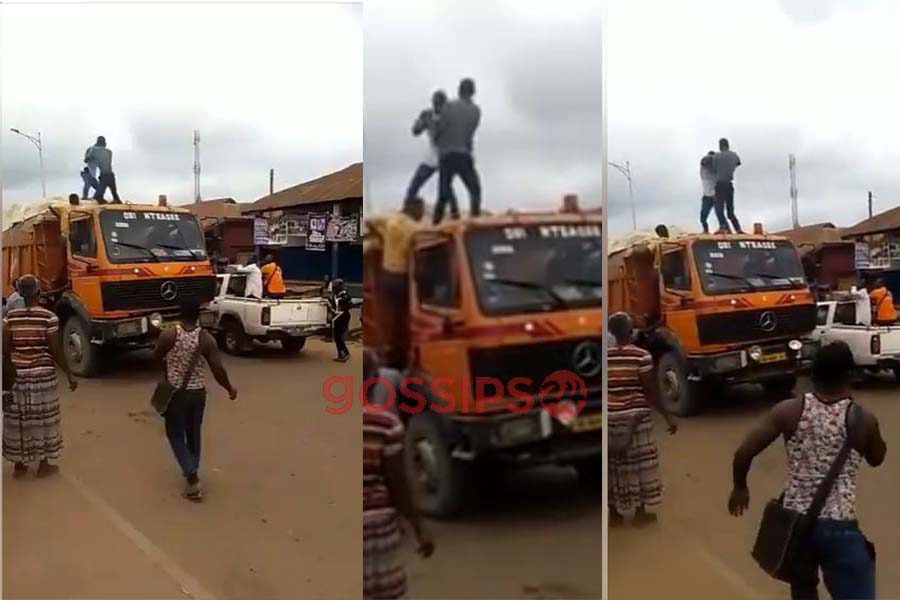 Two men, Men fight on a truck,