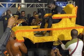 Kuami Eugene carried in a palanquin at Adonko Next Level launch